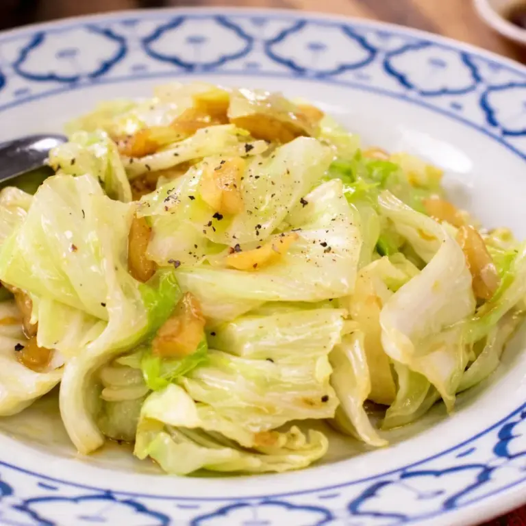 Quick and healthy Thai cabbage fish sauce stir-fry with garlic, ready in 10 minutes.
